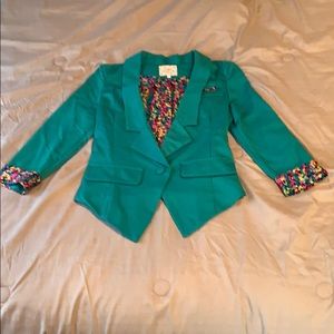 Green blazer with multicolor cuffs